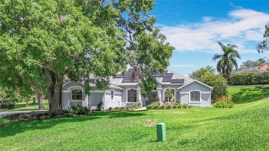 One or more photo(s) has been virtually staged. Nestled at the on Harbor Hills Country Club in Florida - for sale on GolfHomes.com, golf home, golf lot
