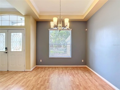 One or more photo(s) has been virtually staged. Nestled at the on Harbor Hills Country Club in Florida - for sale on GolfHomes.com, golf home, golf lot