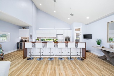 Experience exceptional coastal living in this custom 2023 home on Lemon Bay Golf Club in Florida - for sale on GolfHomes.com, golf home, golf lot