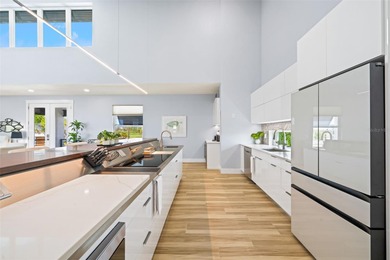 Experience exceptional coastal living in this custom 2023 home on Lemon Bay Golf Club in Florida - for sale on GolfHomes.com, golf home, golf lot