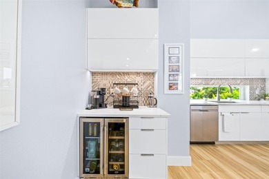 Experience exceptional coastal living in this custom 2023 home on Lemon Bay Golf Club in Florida - for sale on GolfHomes.com, golf home, golf lot