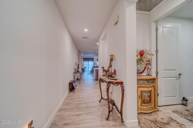 Located in prestigious gated neighborhood of The Canyons At on Laughlin Ranch Golf Club in Arizona - for sale on GolfHomes.com, golf home, golf lot