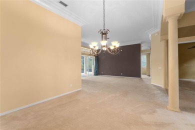 Welcome to this elegant residence in the highly sought-after on Hunters Green Country Club in Florida - for sale on GolfHomes.com, golf home, golf lot