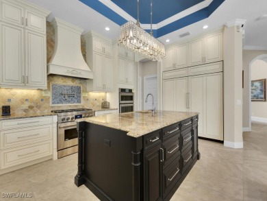 Welcome to one of the most stunning lakefront homes in on Fiddlesticks Country Club in Florida - for sale on GolfHomes.com, golf home, golf lot