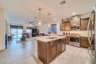 Located in prestigious gated neighborhood of The Canyons At on Laughlin Ranch Golf Club in Arizona - for sale on GolfHomes.com, golf home, golf lot