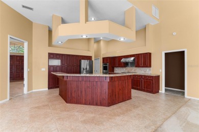 Welcome to this elegant residence in the highly sought-after on Hunters Green Country Club in Florida - for sale on GolfHomes.com, golf home, golf lot