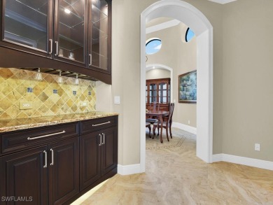 Welcome to one of the most stunning lakefront homes in on Fiddlesticks Country Club in Florida - for sale on GolfHomes.com, golf home, golf lot