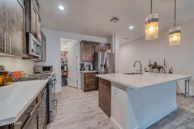 Located in prestigious gated neighborhood of The Canyons At on Laughlin Ranch Golf Club in Arizona - for sale on GolfHomes.com, golf home, golf lot