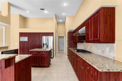 Welcome to this elegant residence in the highly sought-after on Hunters Green Country Club in Florida - for sale on GolfHomes.com, golf home, golf lot