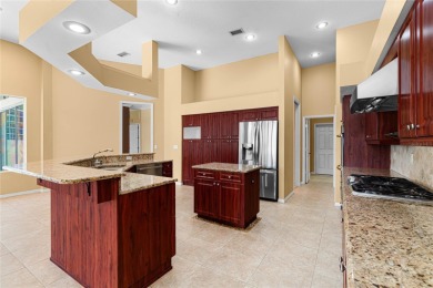 Welcome to this elegant residence in the highly sought-after on Hunters Green Country Club in Florida - for sale on GolfHomes.com, golf home, golf lot