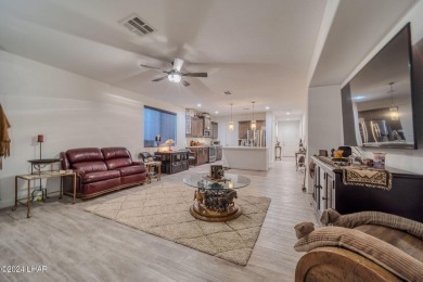 Located in prestigious gated neighborhood of The Canyons At on Laughlin Ranch Golf Club in Arizona - for sale on GolfHomes.com, golf home, golf lot