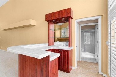 Welcome to this elegant residence in the highly sought-after on Hunters Green Country Club in Florida - for sale on GolfHomes.com, golf home, golf lot