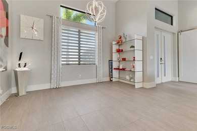 Discover modern coastal living in this Beautiful custom Home on Burnt Store Golf Club in Florida - for sale on GolfHomes.com, golf home, golf lot