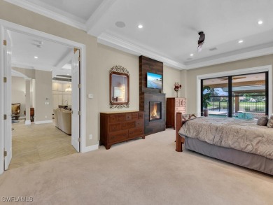 Welcome to one of the most stunning lakefront homes in on Fiddlesticks Country Club in Florida - for sale on GolfHomes.com, golf home, golf lot
