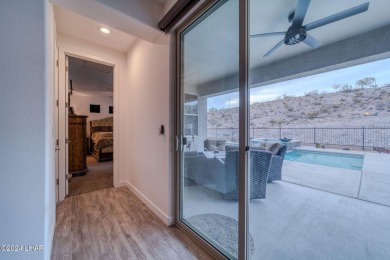 Located in prestigious gated neighborhood of The Canyons At on Laughlin Ranch Golf Club in Arizona - for sale on GolfHomes.com, golf home, golf lot
