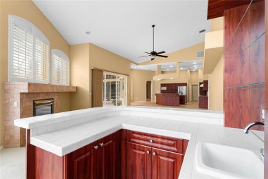 Welcome to this elegant residence in the highly sought-after on Hunters Green Country Club in Florida - for sale on GolfHomes.com, golf home, golf lot