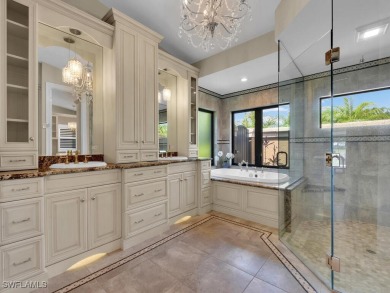 Welcome to one of the most stunning lakefront homes in on Fiddlesticks Country Club in Florida - for sale on GolfHomes.com, golf home, golf lot