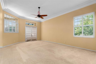 Welcome to this elegant residence in the highly sought-after on Hunters Green Country Club in Florida - for sale on GolfHomes.com, golf home, golf lot