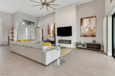 Discover modern coastal living in this Beautiful custom Home on Burnt Store Golf Club in Florida - for sale on GolfHomes.com, golf home, golf lot