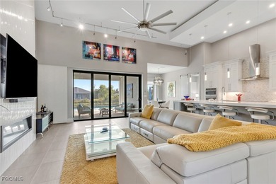 Discover modern coastal living in this Beautiful custom Home on Burnt Store Golf Club in Florida - for sale on GolfHomes.com, golf home, golf lot