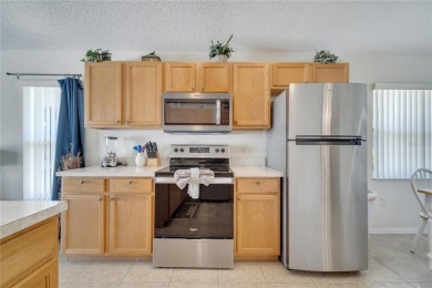 Welcome to your new beautifully updated 4-bedroom, 2-bathroom on Highlands Reserve Golf Club in Florida - for sale on GolfHomes.com, golf home, golf lot