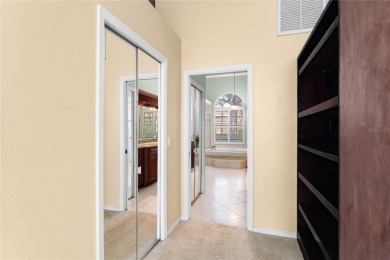 Welcome to this elegant residence in the highly sought-after on Hunters Green Country Club in Florida - for sale on GolfHomes.com, golf home, golf lot