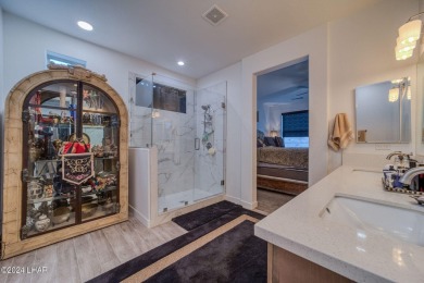 Located in prestigious gated neighborhood of The Canyons At on Laughlin Ranch Golf Club in Arizona - for sale on GolfHomes.com, golf home, golf lot