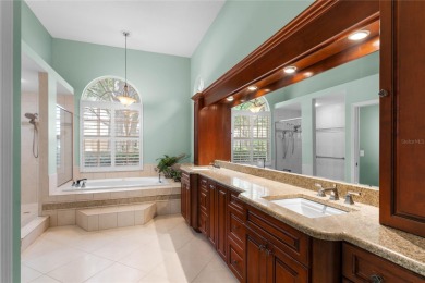 Welcome to this elegant residence in the highly sought-after on Hunters Green Country Club in Florida - for sale on GolfHomes.com, golf home, golf lot
