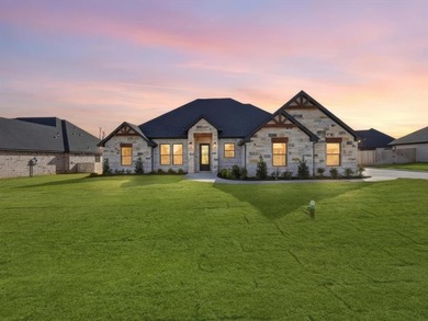 Step into a beautifully crafted Ryco Homes build in the heart of on Pecan Plantation Country Club in Texas - for sale on GolfHomes.com, golf home, golf lot