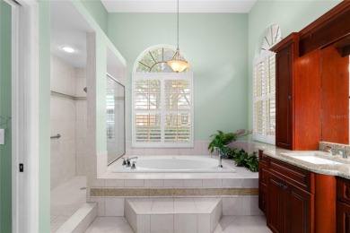 Welcome to this elegant residence in the highly sought-after on Hunters Green Country Club in Florida - for sale on GolfHomes.com, golf home, golf lot