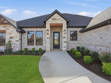 Step into a beautifully crafted Ryco Homes build in the heart of on Pecan Plantation Country Club in Texas - for sale on GolfHomes.com, golf home, golf lot