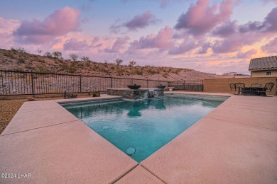 Located in prestigious gated neighborhood of The Canyons At on Laughlin Ranch Golf Club in Arizona - for sale on GolfHomes.com, golf home, golf lot