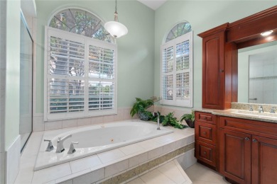 Welcome to this elegant residence in the highly sought-after on Hunters Green Country Club in Florida - for sale on GolfHomes.com, golf home, golf lot