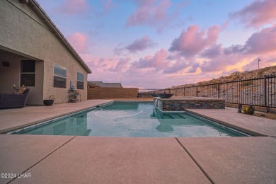 Located in prestigious gated neighborhood of The Canyons At on Laughlin Ranch Golf Club in Arizona - for sale on GolfHomes.com, golf home, golf lot