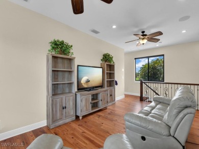 Welcome to one of the most stunning lakefront homes in on Fiddlesticks Country Club in Florida - for sale on GolfHomes.com, golf home, golf lot