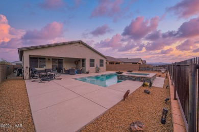 Located in prestigious gated neighborhood of The Canyons At on Laughlin Ranch Golf Club in Arizona - for sale on GolfHomes.com, golf home, golf lot