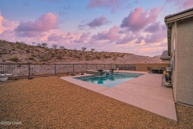 Located in prestigious gated neighborhood of The Canyons At on Laughlin Ranch Golf Club in Arizona - for sale on GolfHomes.com, golf home, golf lot