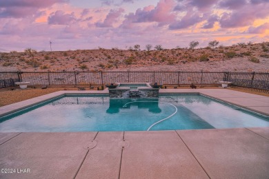 Located in prestigious gated neighborhood of The Canyons At on Laughlin Ranch Golf Club in Arizona - for sale on GolfHomes.com, golf home, golf lot