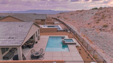 Located in prestigious gated neighborhood of The Canyons At on Laughlin Ranch Golf Club in Arizona - for sale on GolfHomes.com, golf home, golf lot