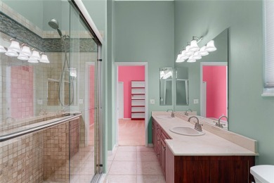 Welcome to this elegant residence in the highly sought-after on Hunters Green Country Club in Florida - for sale on GolfHomes.com, golf home, golf lot