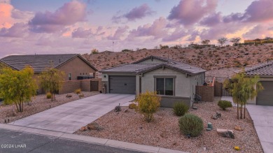 Located in prestigious gated neighborhood of The Canyons At on Laughlin Ranch Golf Club in Arizona - for sale on GolfHomes.com, golf home, golf lot