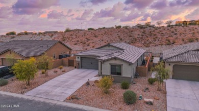 Located in prestigious gated neighborhood of The Canyons At on Laughlin Ranch Golf Club in Arizona - for sale on GolfHomes.com, golf home, golf lot