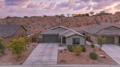 Located in prestigious gated neighborhood of The Canyons At on Laughlin Ranch Golf Club in Arizona - for sale on GolfHomes.com, golf home, golf lot