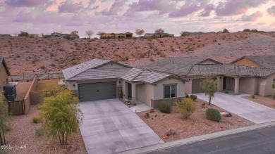 Located in prestigious gated neighborhood of The Canyons At on Laughlin Ranch Golf Club in Arizona - for sale on GolfHomes.com, golf home, golf lot