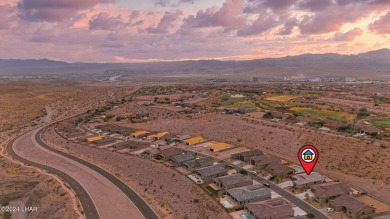 Located in prestigious gated neighborhood of The Canyons At on Laughlin Ranch Golf Club in Arizona - for sale on GolfHomes.com, golf home, golf lot