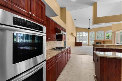 Welcome to this elegant residence in the highly sought-after on Hunters Green Country Club in Florida - for sale on GolfHomes.com, golf home, golf lot