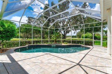 Welcome to this elegant residence in the highly sought-after on Hunters Green Country Club in Florida - for sale on GolfHomes.com, golf home, golf lot