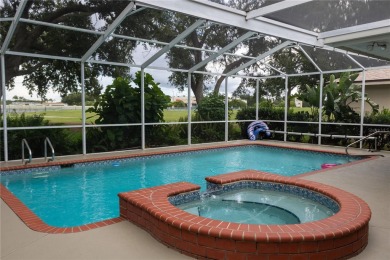 Welcome to this charming 3 bedroom, 3 bath pool home nestled in on Cypresswood Golf and Country Club in Florida - for sale on GolfHomes.com, golf home, golf lot