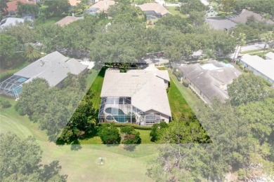 Welcome to this elegant residence in the highly sought-after on Hunters Green Country Club in Florida - for sale on GolfHomes.com, golf home, golf lot