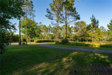 Welcome to this elegant residence in the highly sought-after on Hunters Green Country Club in Florida - for sale on GolfHomes.com, golf home, golf lot
